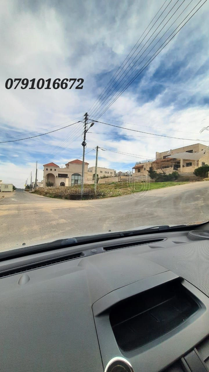 أرض في طريق المطار خلف مدارس العالمية و ammanwaves - 460,000 دأ - صورة 1