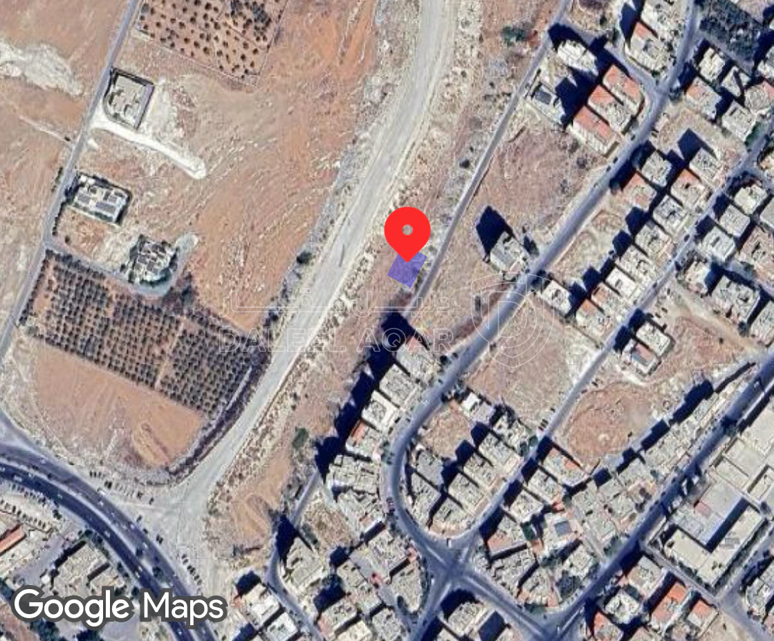 أرض في قطعة ارض على شارع ١٣ منسوب - 130,000 دأ - صورة 1