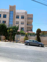 شقة - مرج الحمام -شارع مسجد الربوه - 100000 دأ