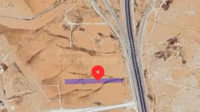أرض في القطعة تقع على شارع 100 مباشرة مقابل الجمركالجديد - 130,000 دأ - صورة 1
