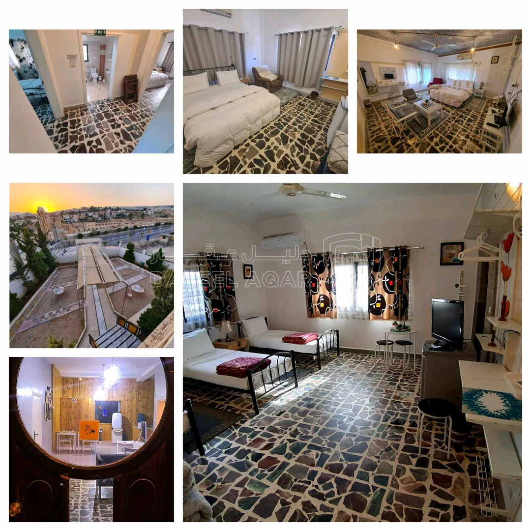 مبنى في جرش بحد قوس النصر من الشرق على الشارع العام فندق ب - 800,000 دأ - صورة 1