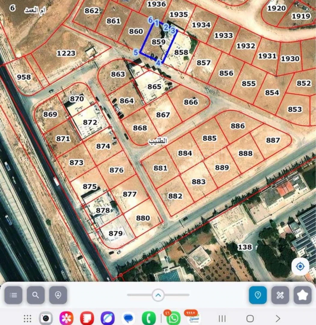 أرض في الطنيب خلف جامعة الاسراء تصلح سكن منسوب طابق - 85,000 دأ - صورة 1