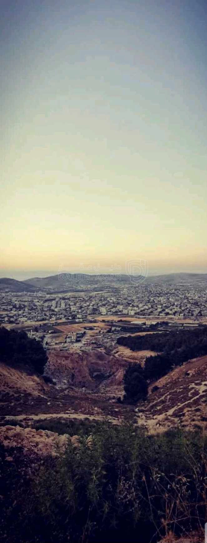 أرض في الكمالية  - 200,000 دأ - صورة 1