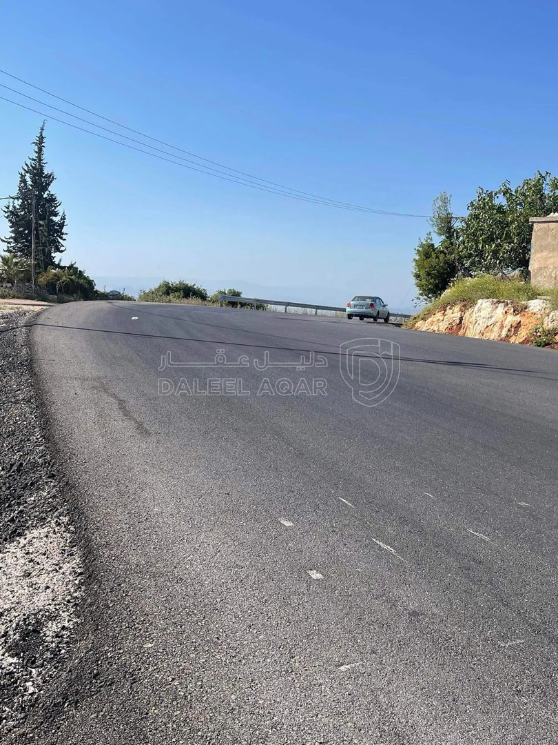 أرض في عجلون دير صماديه - 125,000 دأ - صورة 1