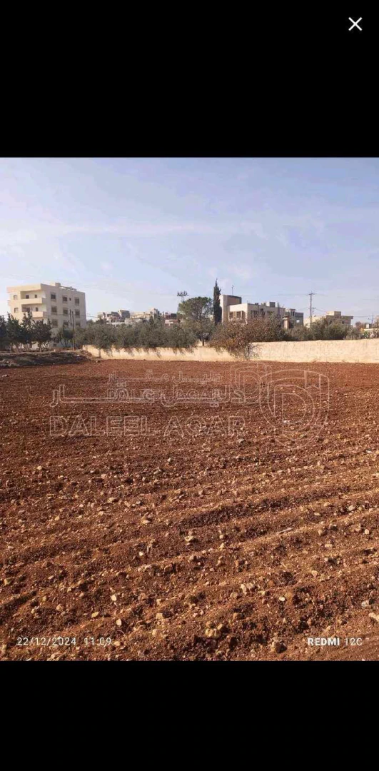 أرض في حسبان/مقابل مبنى البلدية السابق - 285,000 دأ - صورة 1