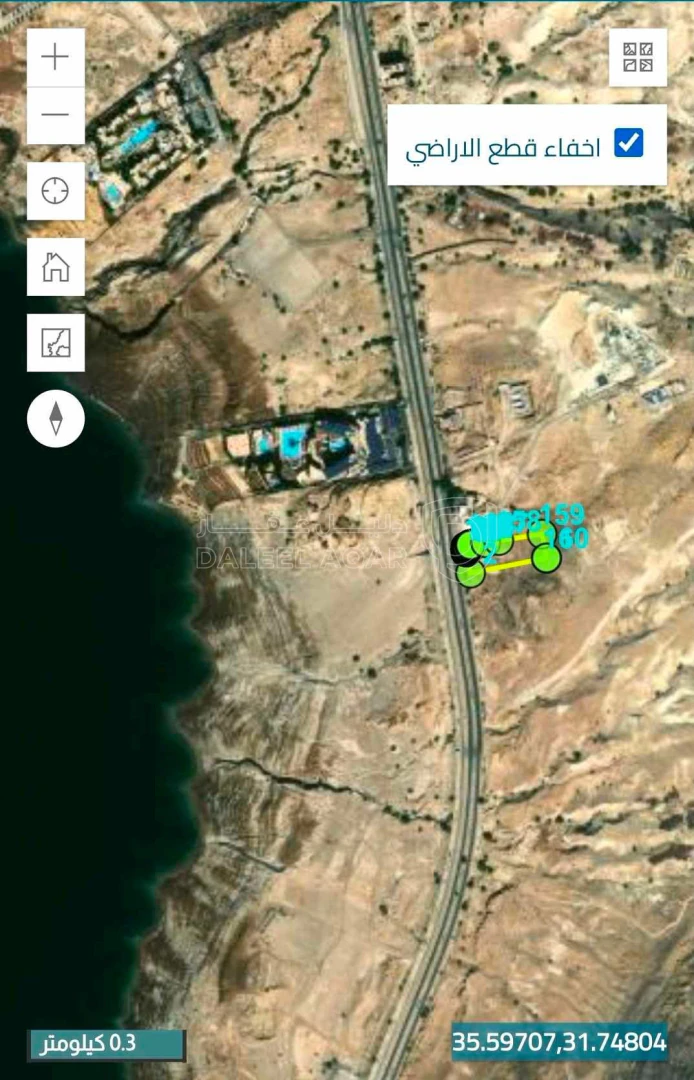 أرض في ارض للبيع مقابل البحر الميت على الشارع السياحي - 3,000,000 دأ - صورة 1