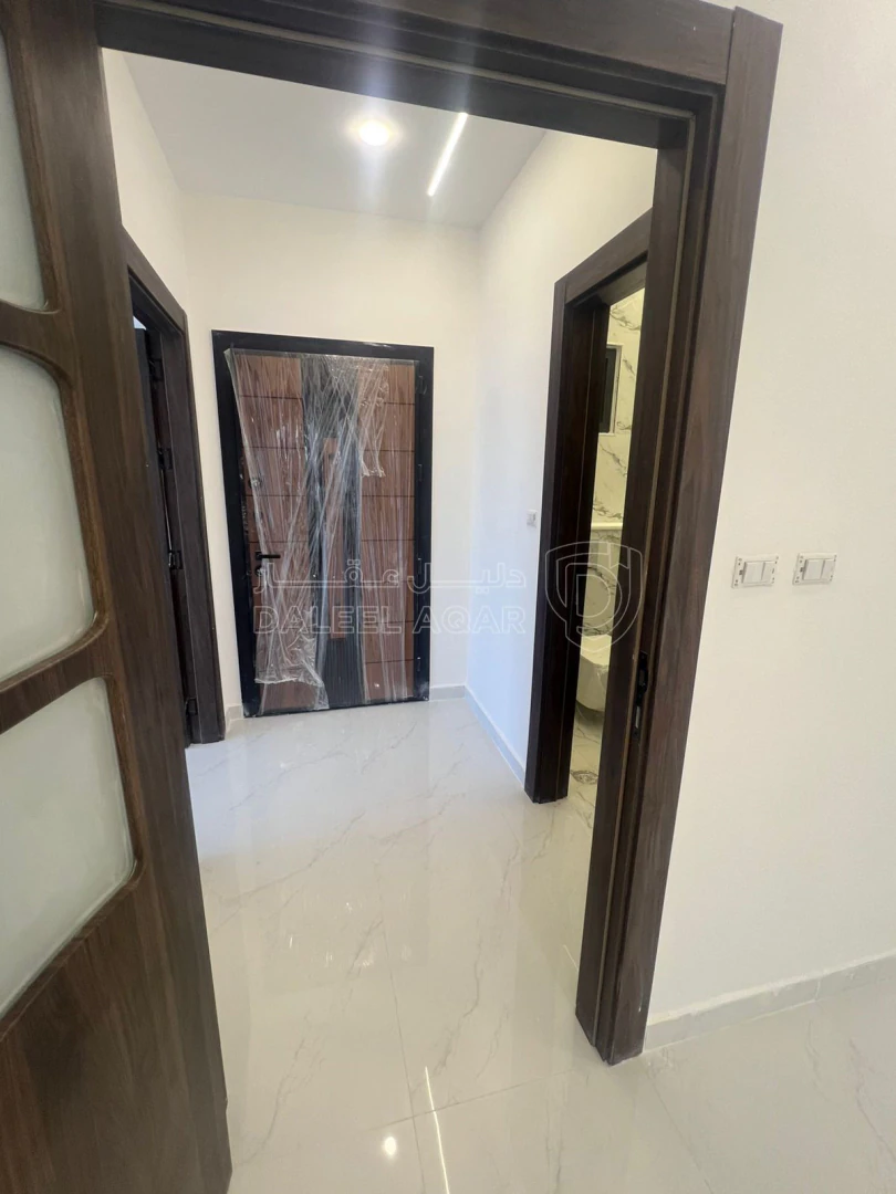 شقة في طبربور - بالقرب من محطة طارق للباص السريع - 95,000 دأ - صورة 1