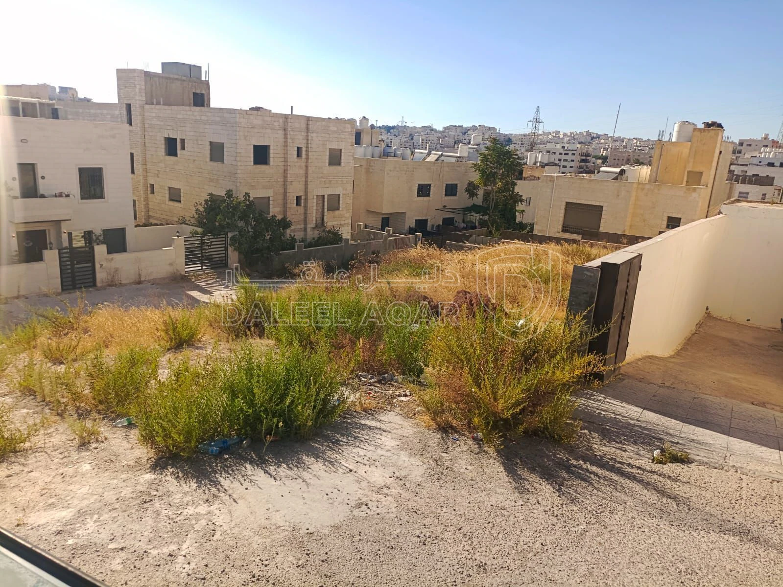 أرض في البنيات بالقرب  من السوق التجاري - 105,000 دأ - صورة 7