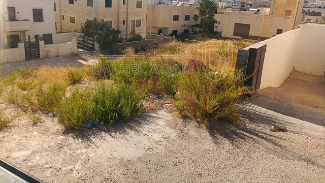 أرض في البنيات بالقرب  من السوق التجاري - 105,000 دأ - صورة NaN