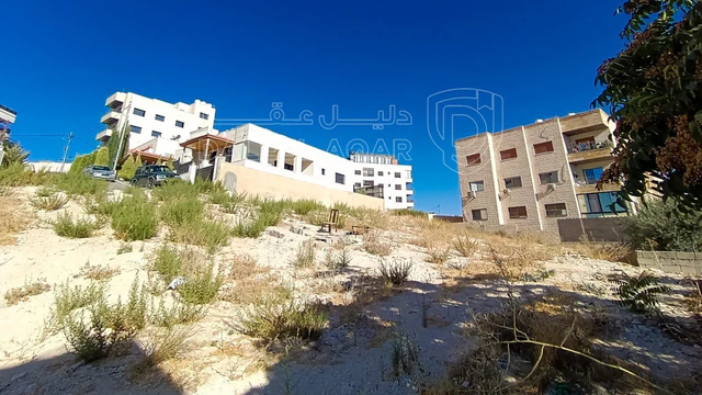 أرض في البنيات بالقرب  من السوق التجاري - 105,000 دأ - صورة NaN