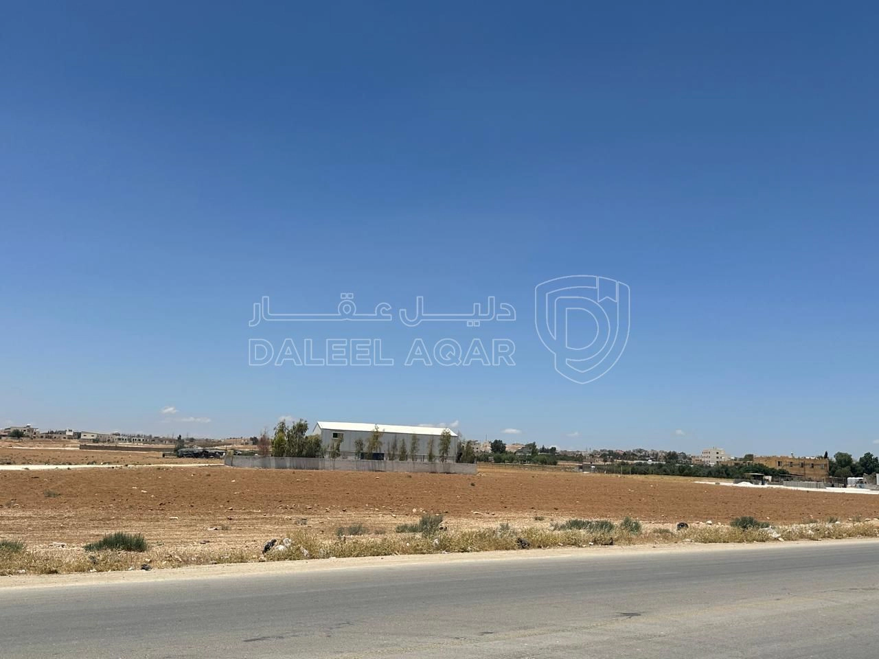 أرض في رجم الشامي بالقرب من شارع ال100 - 47,240 دأ - صورة 1