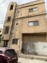 مبنى في اربد شارع صلاح الدين الأيوبي تحت دوار المغسلة  - 55,000 دأ - صورة NaN