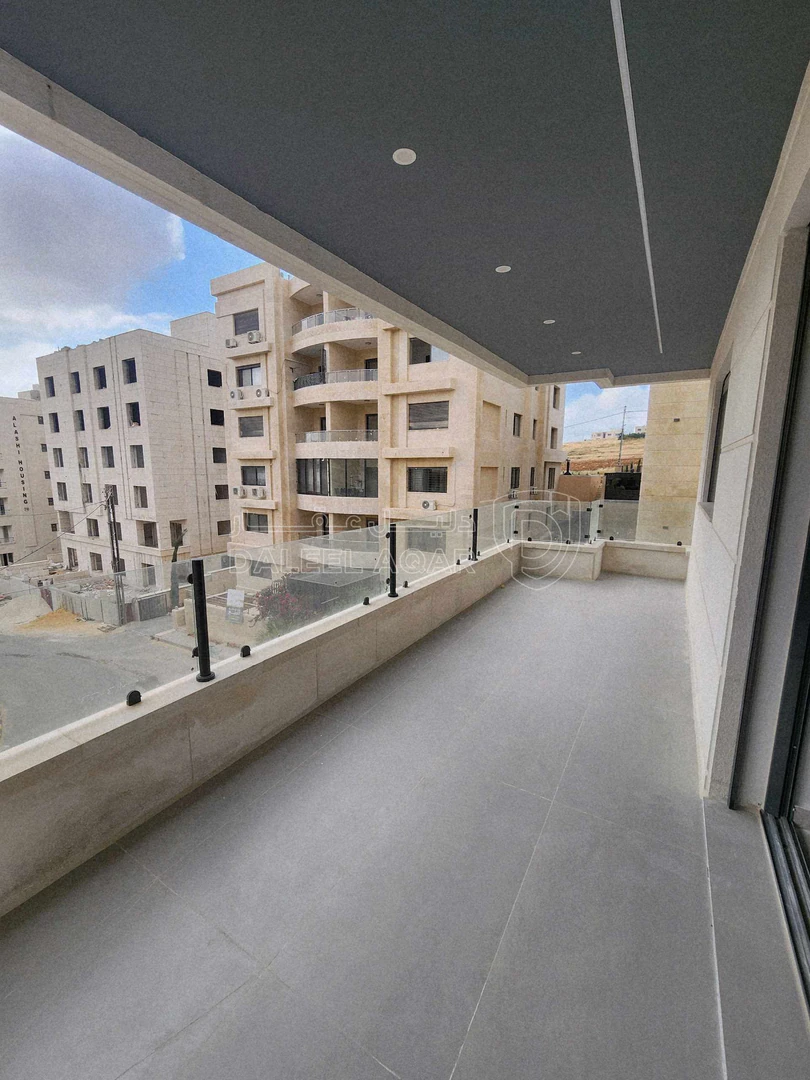 شقة في حي الصحابة  رجم عميش بقرب كرادور عبدون وشارع المطا - 175,000 دأ - صورة 1