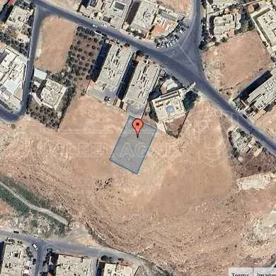 أرض في أرض سكنية للبيع في طبربور – حي أم العقارب، عمان - 200,000 دأ - صورة 1