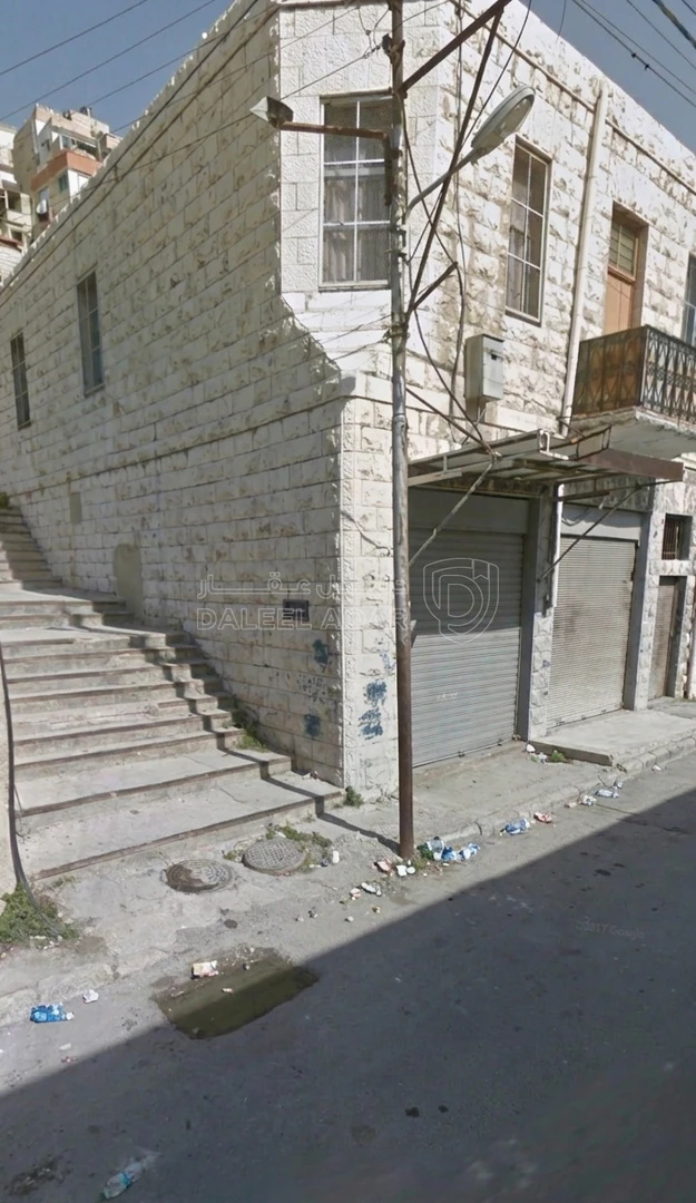 مبنى في مبني طابقين، بيت + محلات تجاري مؤجر ب ٢٠٠-٢٤٠ شهري - 55,000 دأ - صورة 1