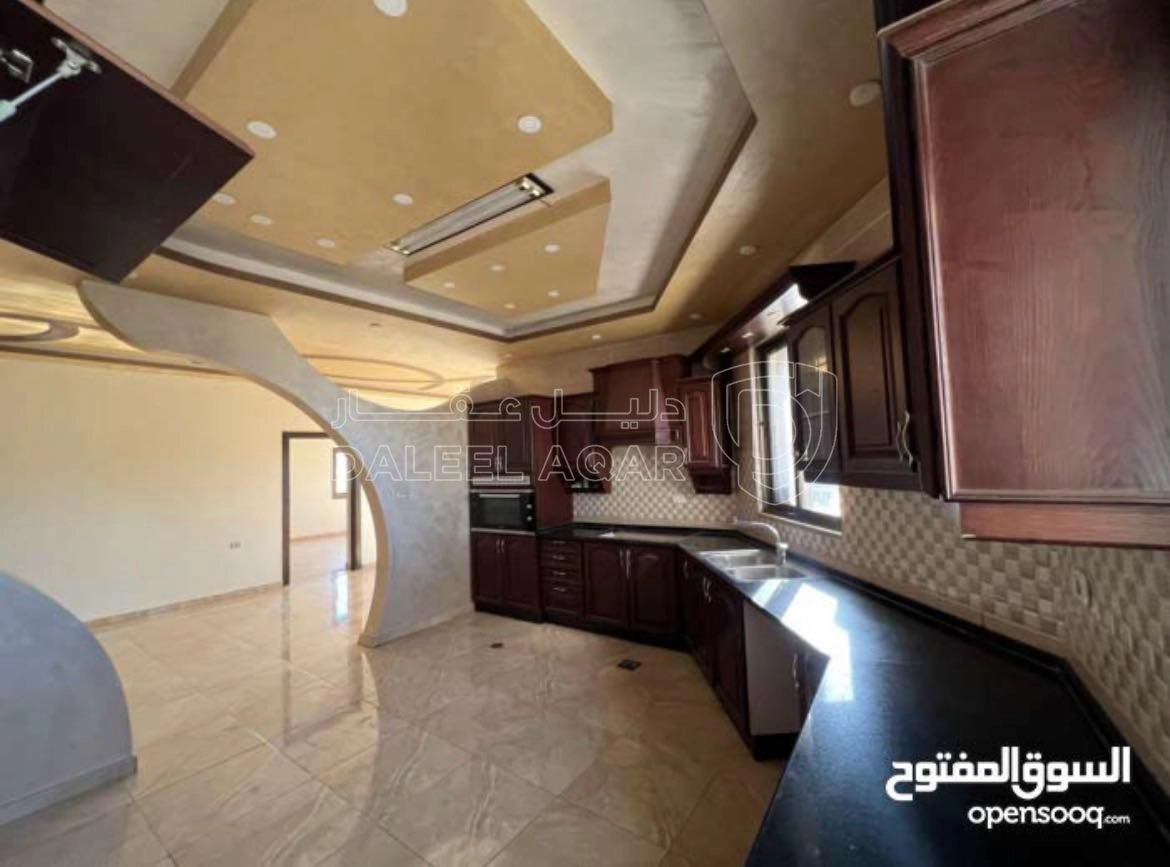 مبنى في منزل للبيع في الجويدة حي الباير - 175,000 دأ - صورة 1