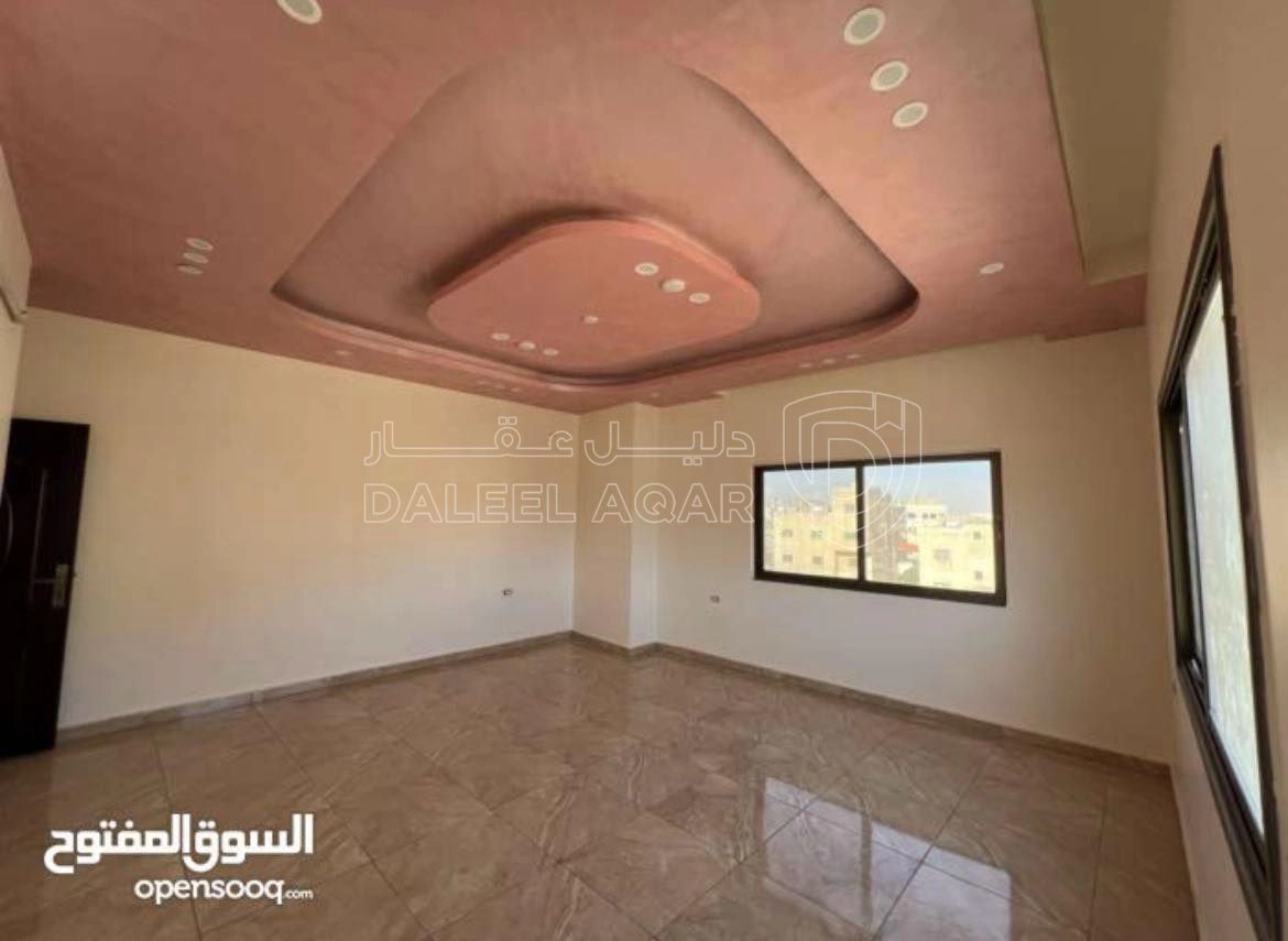 مبنى في منزل للبيع في الجويدة حي الباير - 175,000 دأ - صورة 1