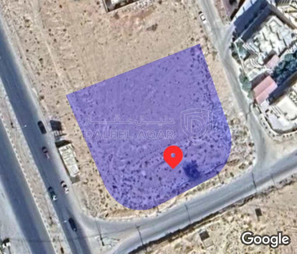 أرض في الزرقاء السخنة مقابل كازيه توتال - 400,000 دأ - صورة 1