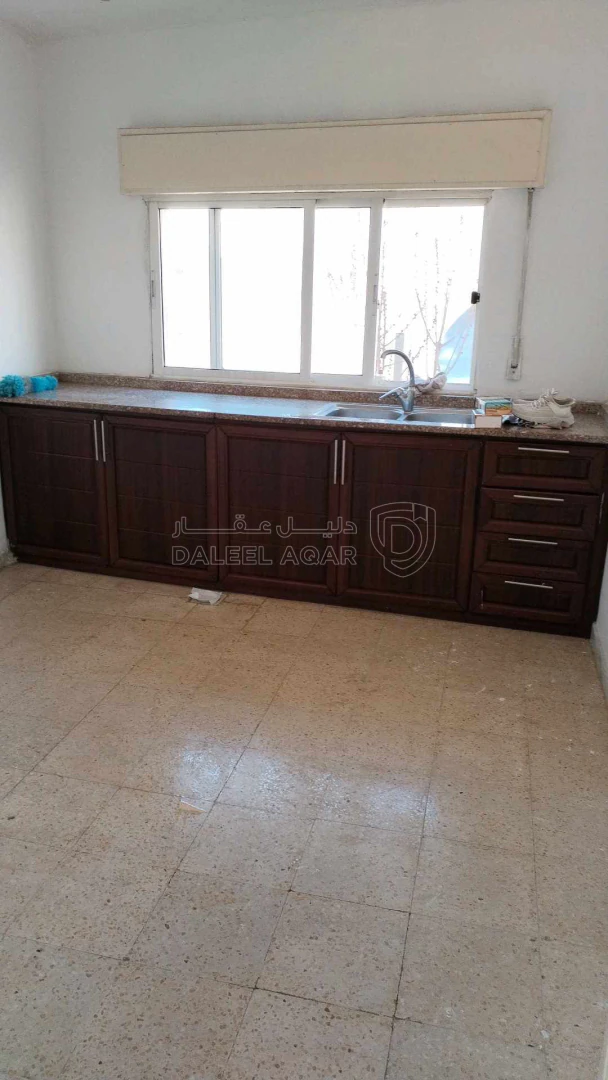 مبنى في ضاحيه الامير حسن قرب مخفر شرطة النزهه  - 190,000 دأ - صورة 1