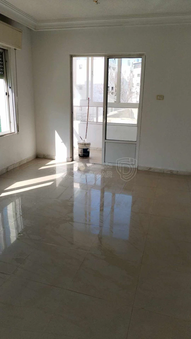 مبنى في ضاحيه الامير حسن قرب مخفر شرطة النزهه  - 190,000 دأ - صورة 1