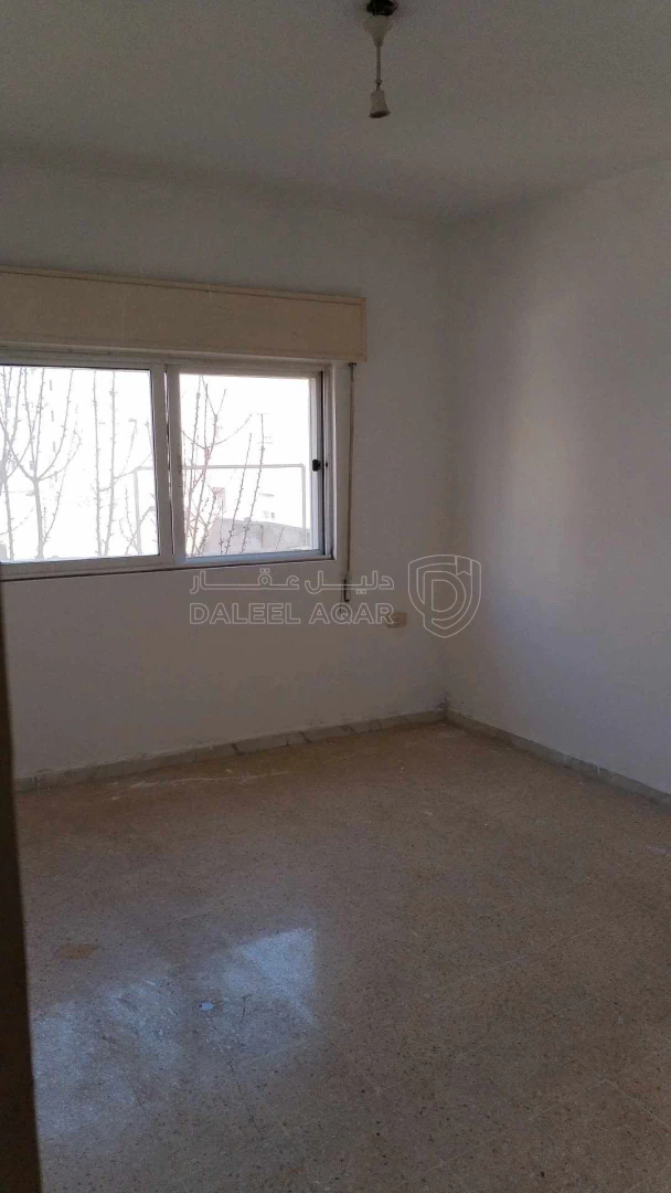 مبنى في ضاحيه الامير حسن قرب مخفر شرطة النزهه  - 190,000 دأ - صورة 1