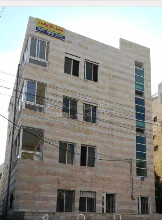 مبنى في ضاحيه الامير حسن قرب مخفر شرطة النزهه  - 190,000 دأ - صورة 1