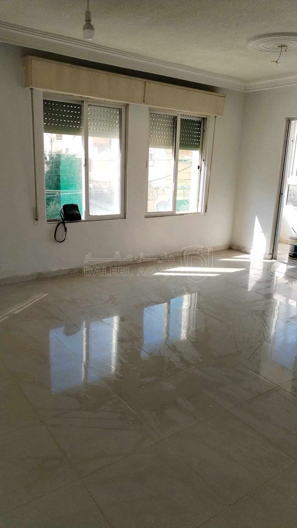 مبنى في ضاحيه الامير حسن قرب مخفر شرطة النزهه  - 190,000 دأ - صورة 1