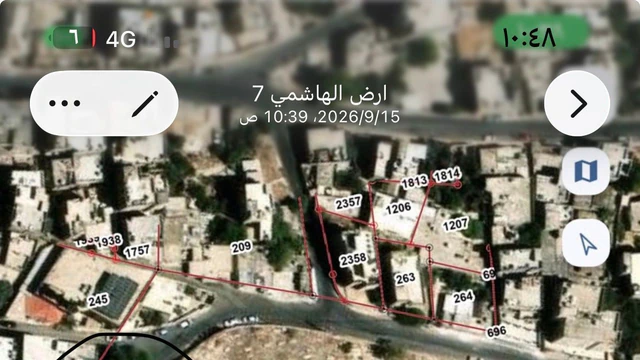 أرض في  ارض في الهاشمي الشمالي مطله على شارع الاستقلال - 12,000 دأ - صورة NaN