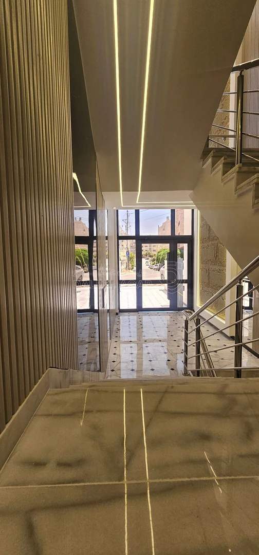 شقة في شقة شبه ارضي للبيع في مرج الحمام اسكان عالية - 140,000 دأ - صورة 1