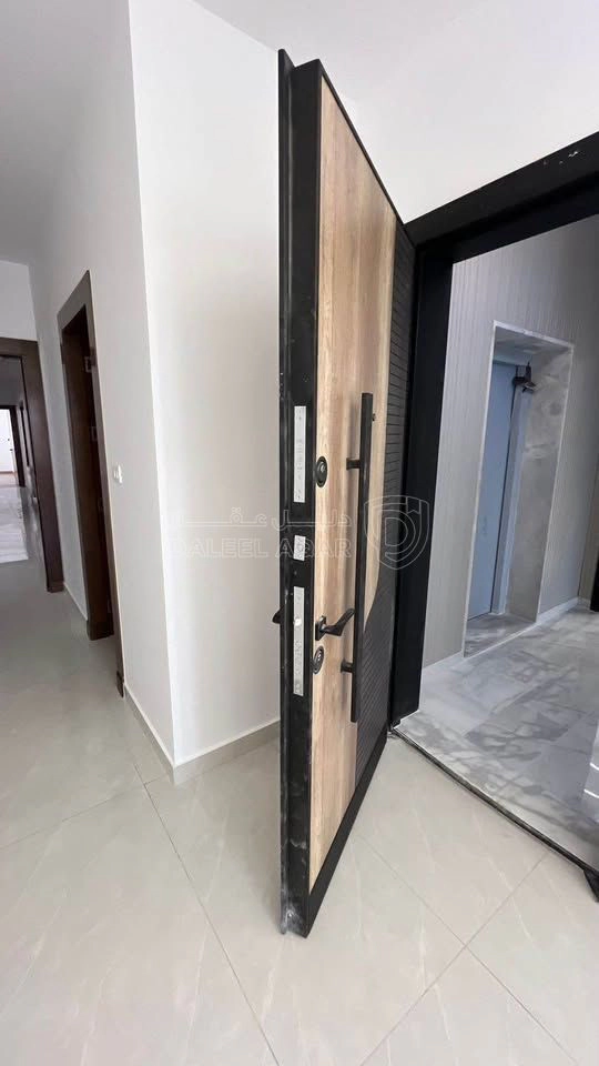 شقة في شقة شبه ارضي للبيع في مرج الحمام اسكان عالية - 140,000 دأ - صورة 1