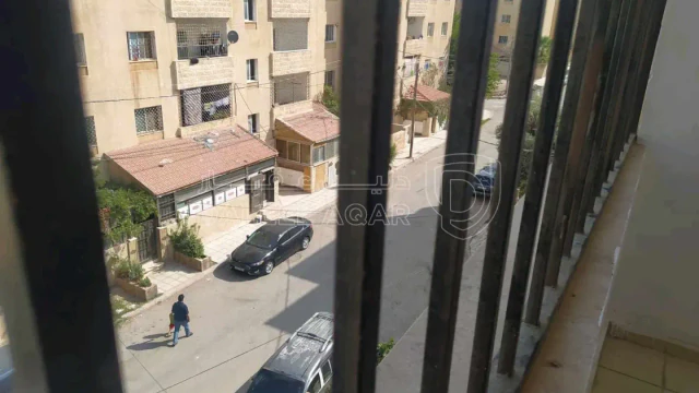 شقة - شقة للبيع بالقرب من مستشفى النديم مادبا - 18000 دأ