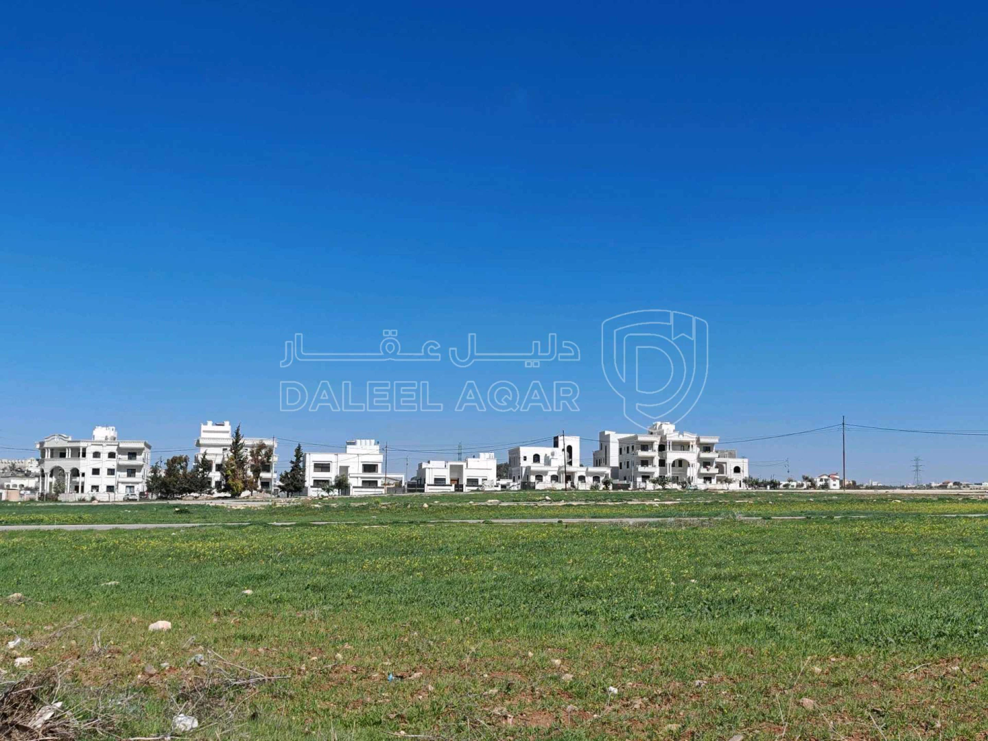 أرض في قرب مسجد نايفة، مقابل بوابة مدينة الشهد 3 - 66,000 دأ - صورة 1