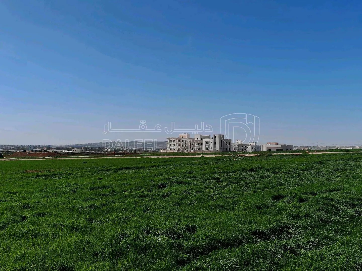 أرض في قرب مسجد نايفة، مقابل بوابة مدينة الشهد 3 - 66,000 دأ - صورة 1