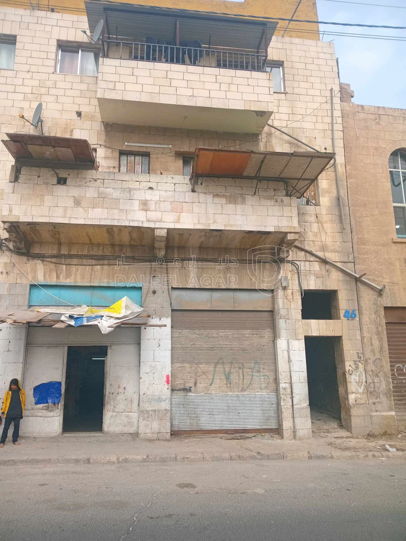 مبنى في عمارة استثمارية للبيع  - 60,000 دأ - صورة 1