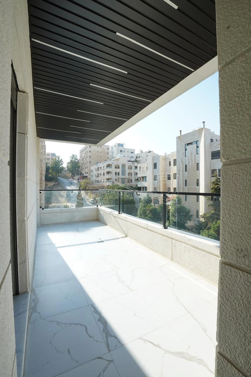 شقة في اخير مع روف بأجمل مناطق ام السماق مشروع 122  - 235,000 دأ - صورة 1