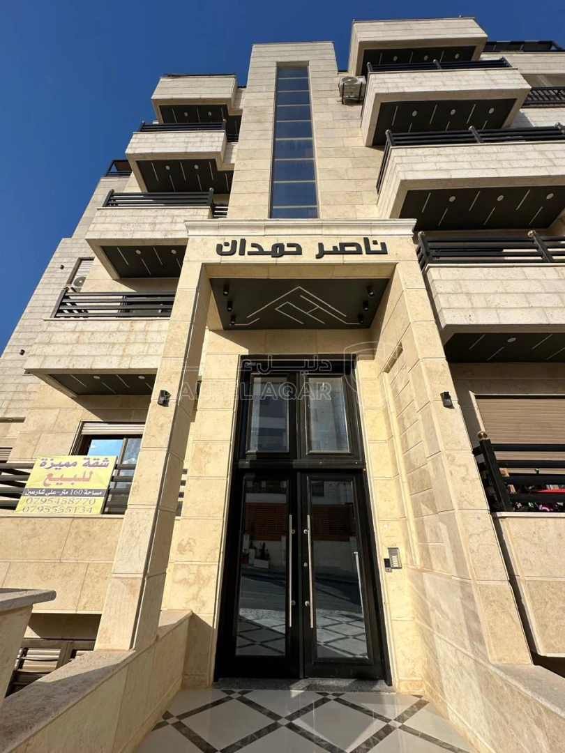 شقة في البنيات - تبعد 1 كم عن شارع خدمات المطار - 89,000 دأ - صورة 1
