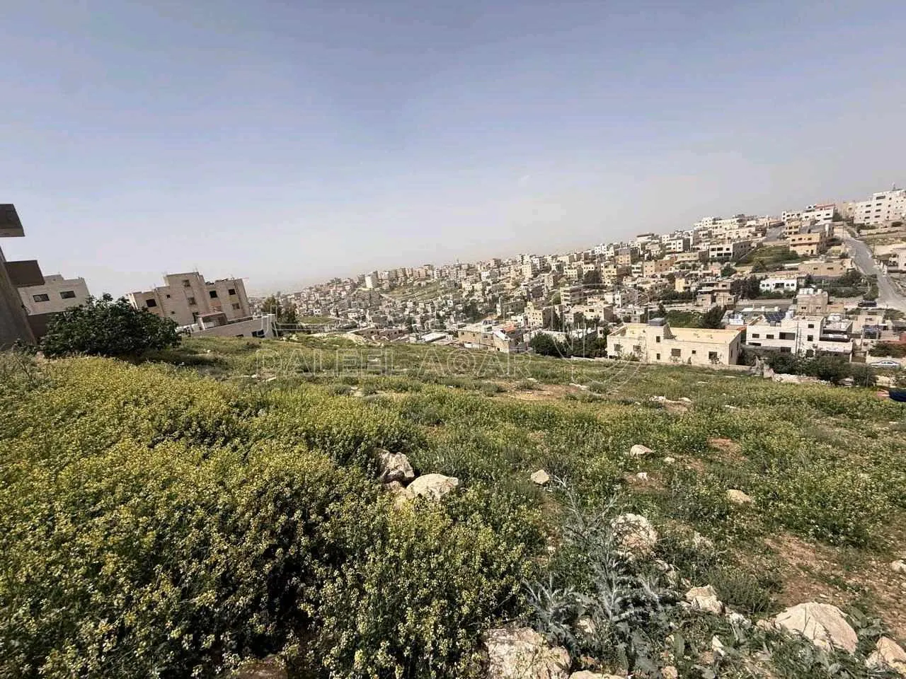 أرض في ارض مميزة جدا بمنطقة سكنية جديدة مقابل المركز الام - 60,000 دأ - صورة 1