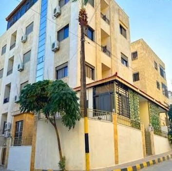 شقة في مقابل مركز امن الشميساني - 200,000 دأ - صورة 1