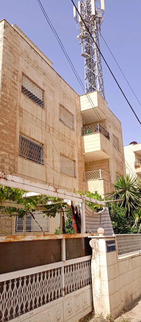 مبنى في الرابية بجانب مركز التراث الفلسطيني - 700,000 دأ - صورة 1