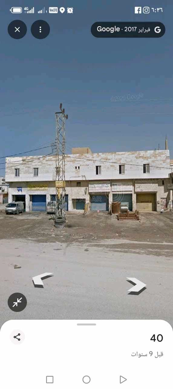 مبنى في سحاب شارع الستين مقابل مثلث اقريه سالم  - 430,000 دأ - صورة 1