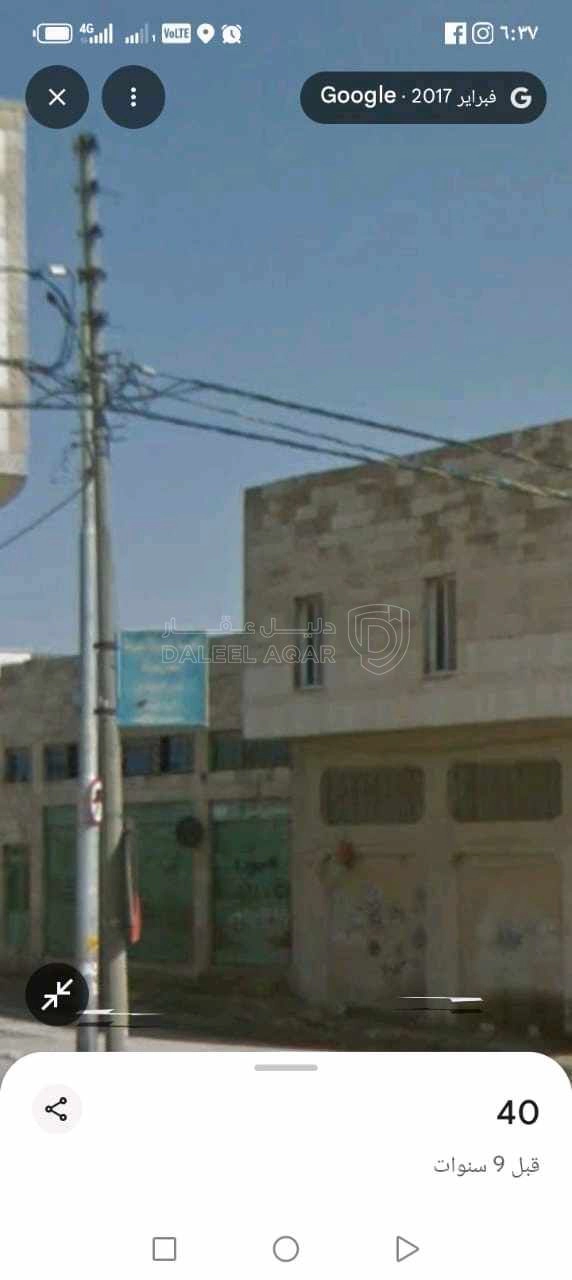 مبنى في سحاب شارع الستين مقابل مثلث اقريه سالم  - 430,000 دأ - صورة 1
