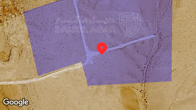 أرض - طريق الصحراوي تبعد عن المطار ١٨كيلو وعن الشارع٨٠٠م - 130000 دأ