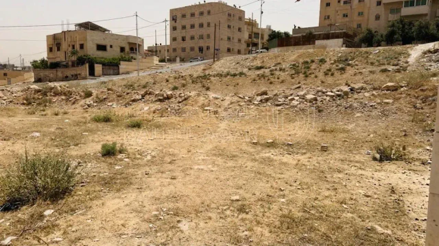 أرض في أرض 1000م بالرصيفة النقب قرب البيبسي قطعة - 94,000 دأ - صورة 1