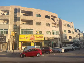 مبنى في الزرقاء الجديده شارع 36 - 1,300,000 دأ - صورة NaN