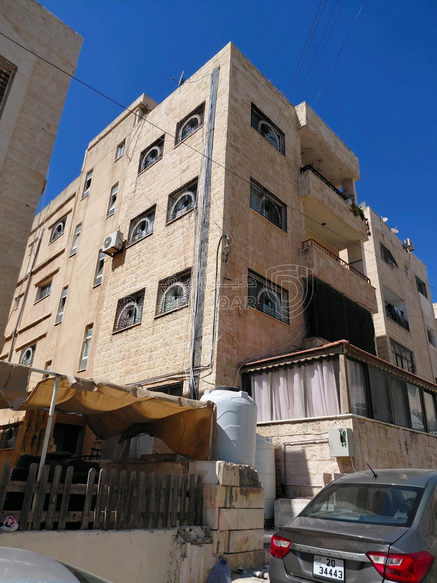 مبنى في الذراع الغربي شارع الفراهيدي - 250,000 دأ - صورة 1