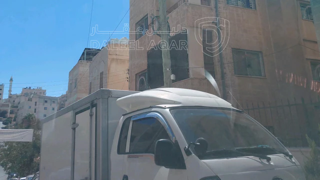 مبنى في الذراع الغربي شارع الفراهيدي - 250,000 دأ - صورة NaN