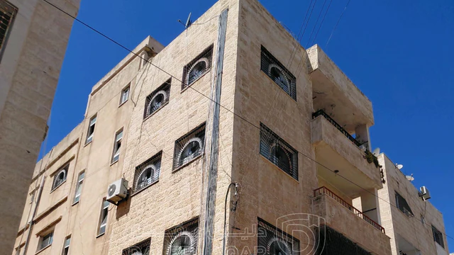 مبنى في الذراع الغربي شارع الفراهيدي - 250,000 دأ - صورة NaN