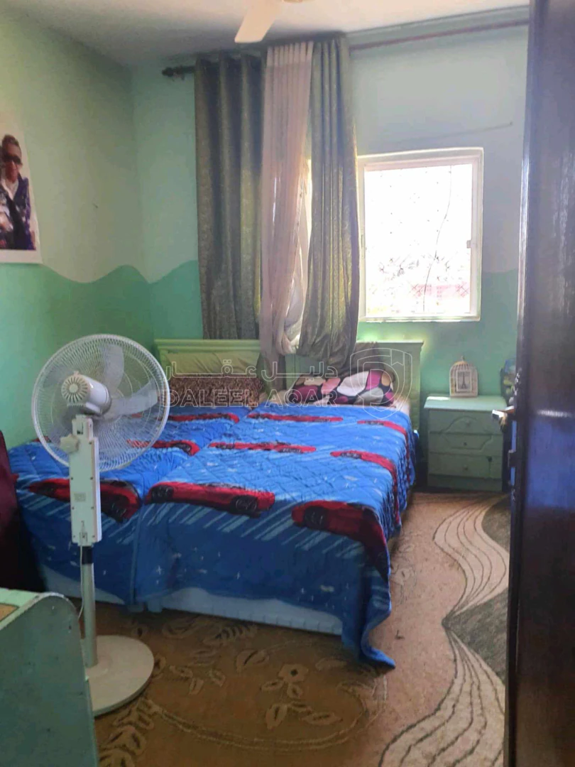 شقة في صخرة الحي الشمالي بالقرب من مسجد المومني - 35,000 دأ - صورة 1