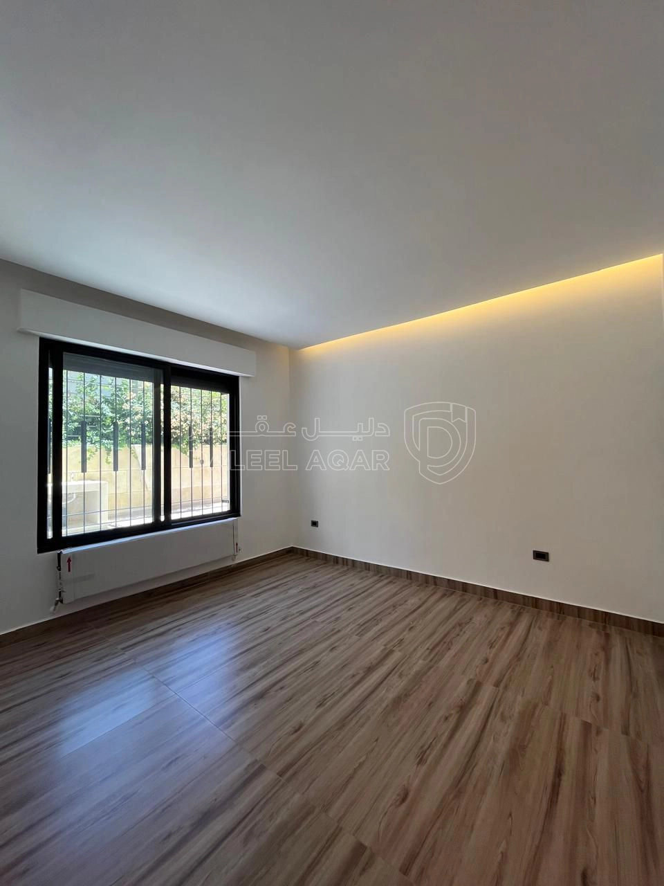 شقة في شبه ارضي مع ترس و باربكيو في اجمل مناطق النخيل - 240,000 دأ - صورة 1