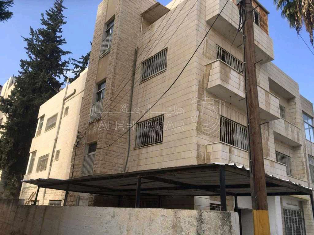 مبنى في عماره سكنية للبيع قريبه من الدوار الثالث  - 500,000 دأ - صورة 1